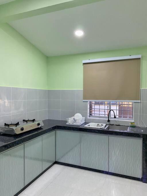 Sri Aman Homestay Джитра Екстериор снимка